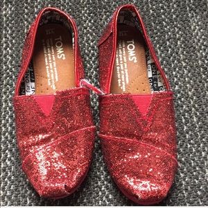Red sparkle toms. Used.